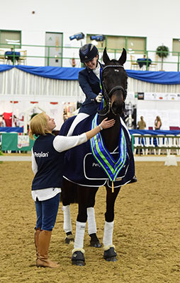 Hannah Jannaway and Coady Bays Gold Dust, winners of the Petplan Equine Area Festival Advanced Medium Open Championship.